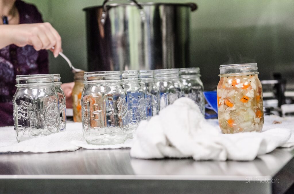 chicken soup canning recipe filling jars