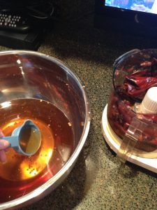 adding liq to puree dried chilies
