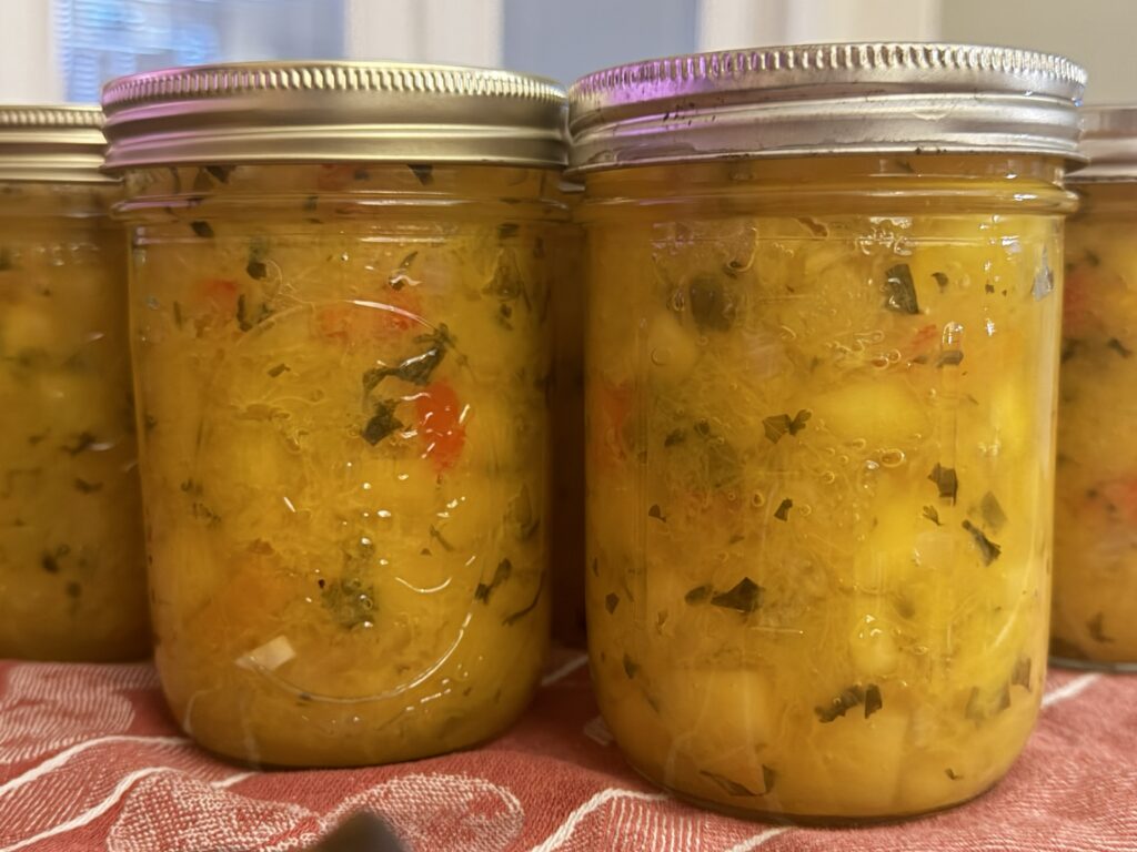 mango salsa in jars cooling close up the canning diva